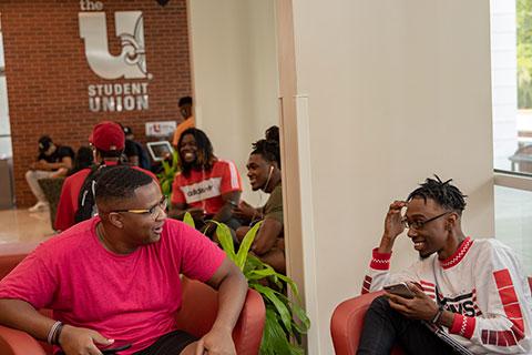 Students in the Bryman College Student Union during an admissions preview event